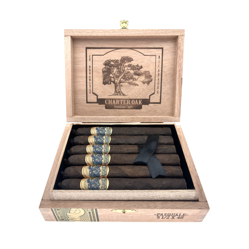 Open box of Charter Oak cigars with intricate band designs arranged neatly.