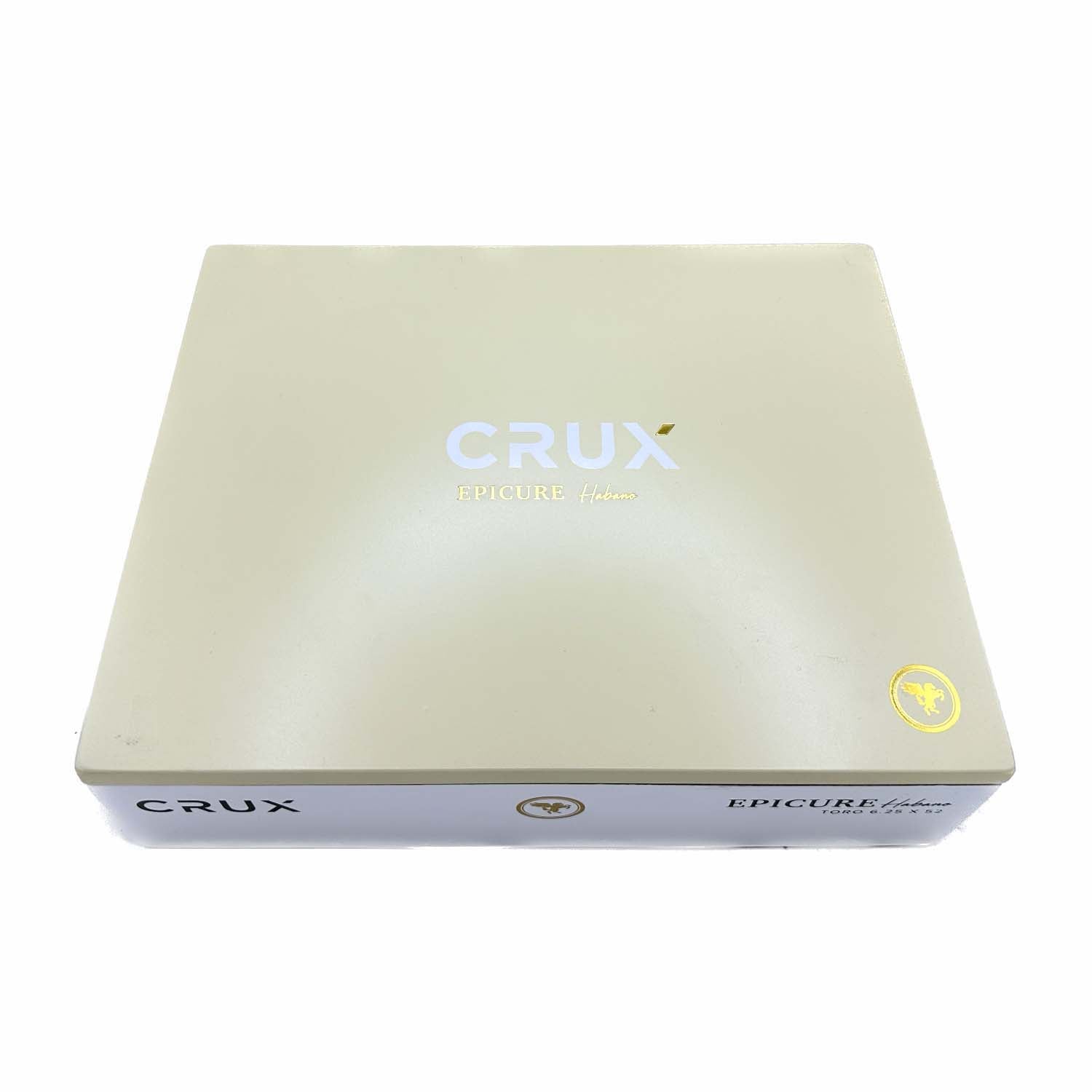 Crux Epicure Habano cigar box with a beige lid and gold emblem, displaying the brand name prominently on top.