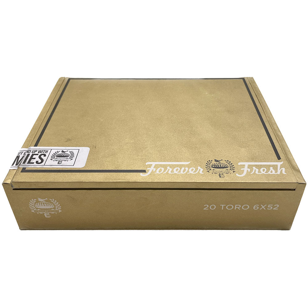 Gold cigar box labeled "Forever Fresh" with "20 Toro 6x52" on the side.