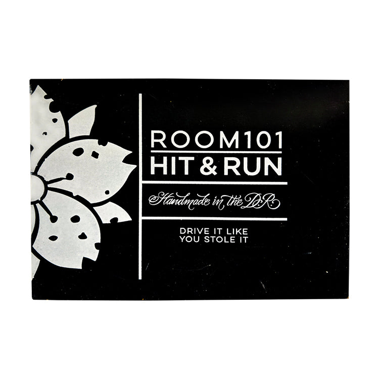 Black and white graphic design with floral motif and text reading "Room101 Hit & Run," "Handmade in the DR," and "Drive it like you stole it."