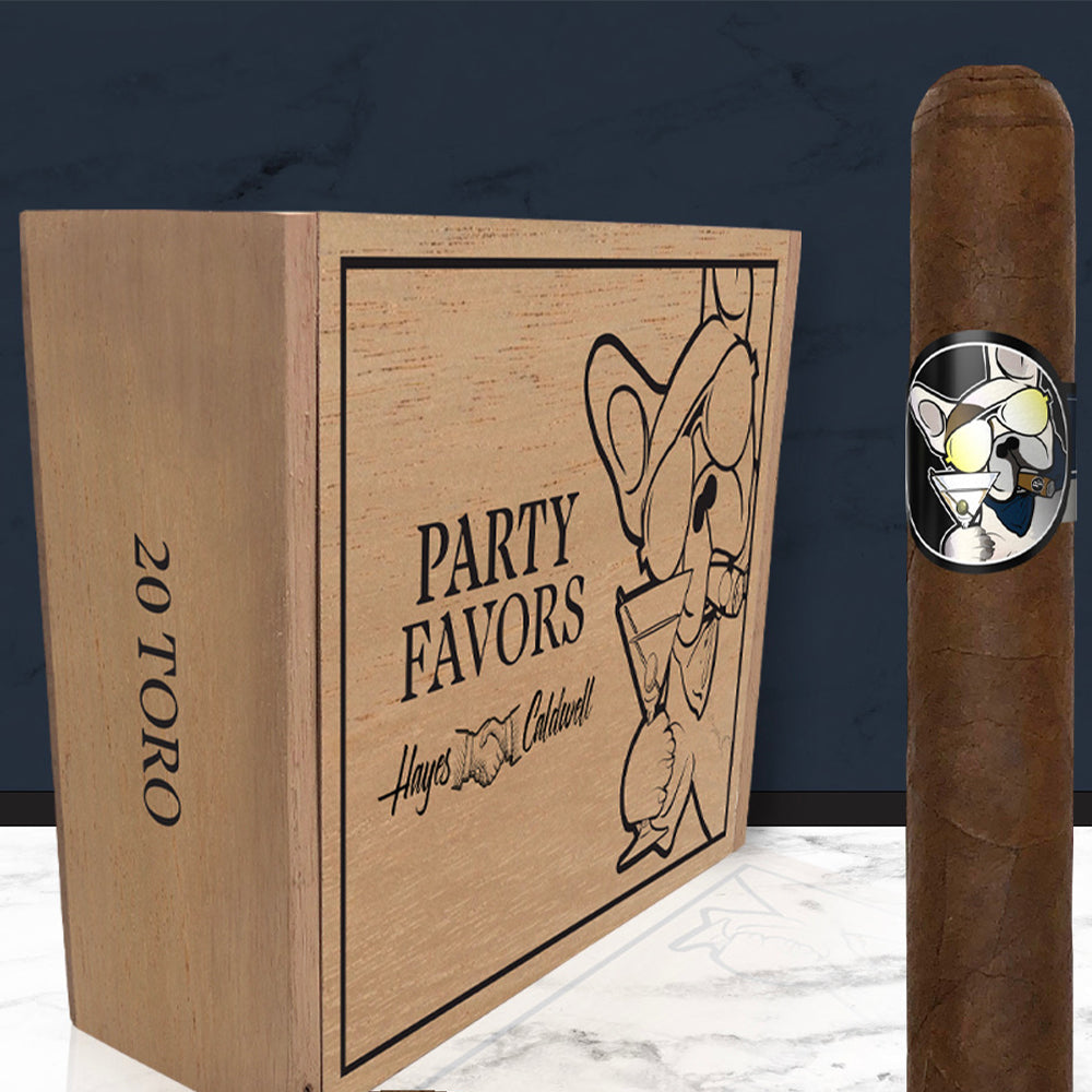 Cigar with bulldog cartoon label next to a wooden box marked "Party Favors 20 Toro Hayes Caldwell."