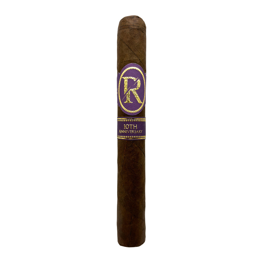 10th anniversary cigar with purple and gold label featuring intricate design against a white background