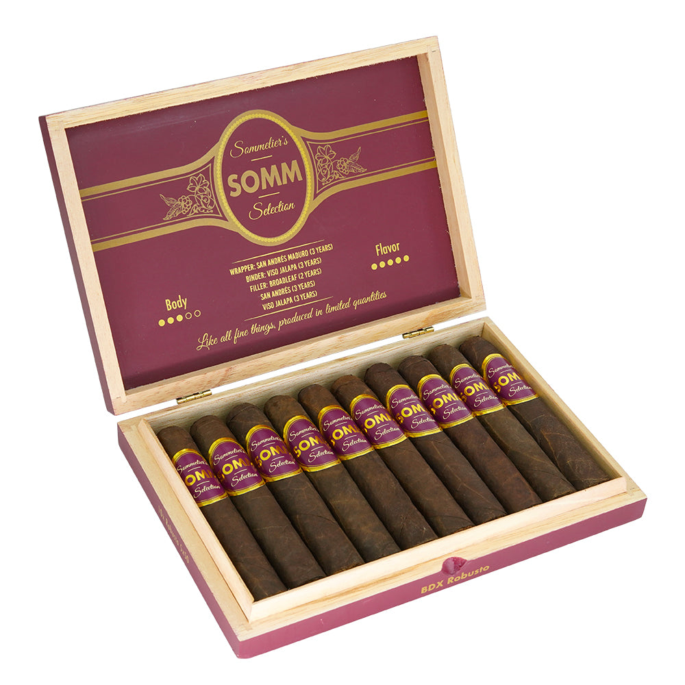 Open wooden box displaying premium Somm Selection cigars with dark wrappers and purple bands.