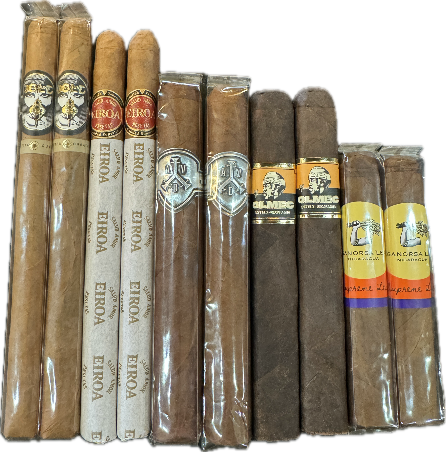 Assorted premium cigars in wrappers featuring Eiroa, Auroa, ATV, Olmec, and Aganorsa brands arranged side by side.