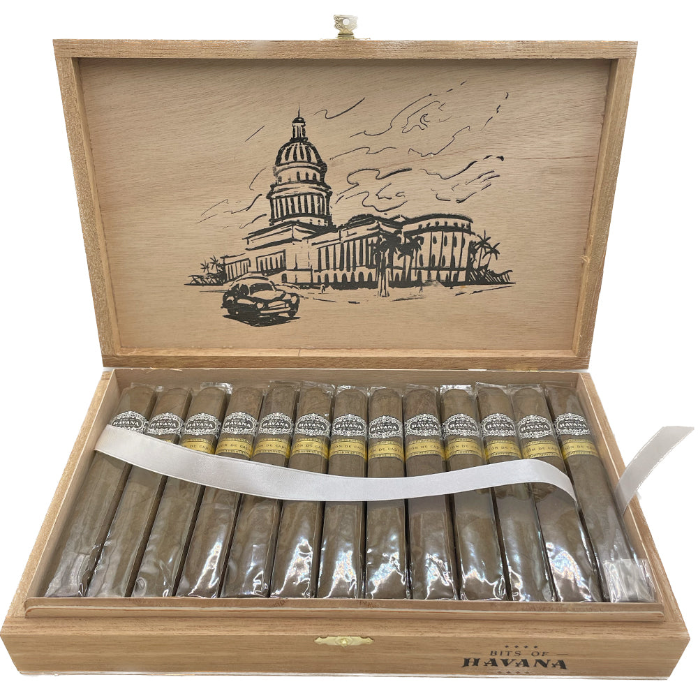 Open wooden cigar box containing premium Havana cigars with illustrated lid showing Havana cityscape.