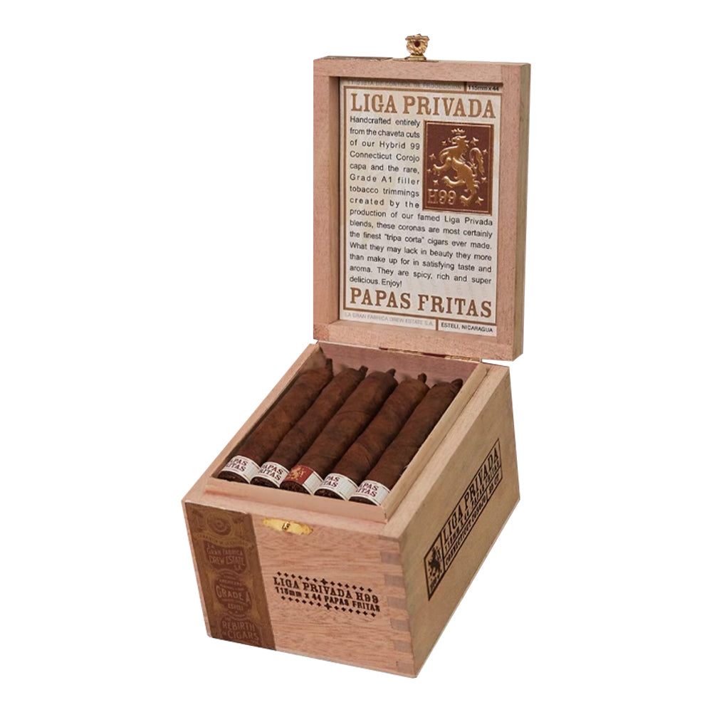 Open box of Liga Privada Papas Fritas cigars with detailed label inside lid displaying product description and branding.
