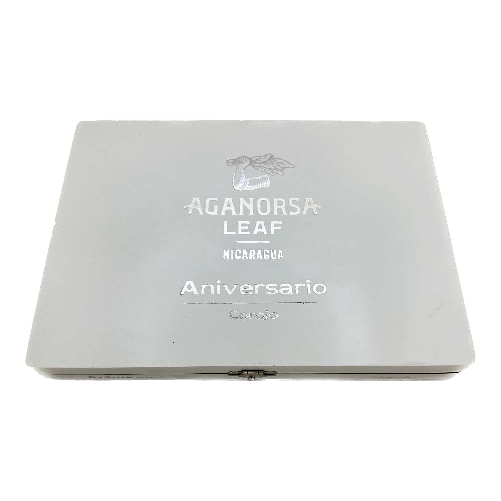 Aganorsa Leaf Aniversario Corojo cigar box with logo and text in silver on a light gray background, indicating Nicaraguan origin.