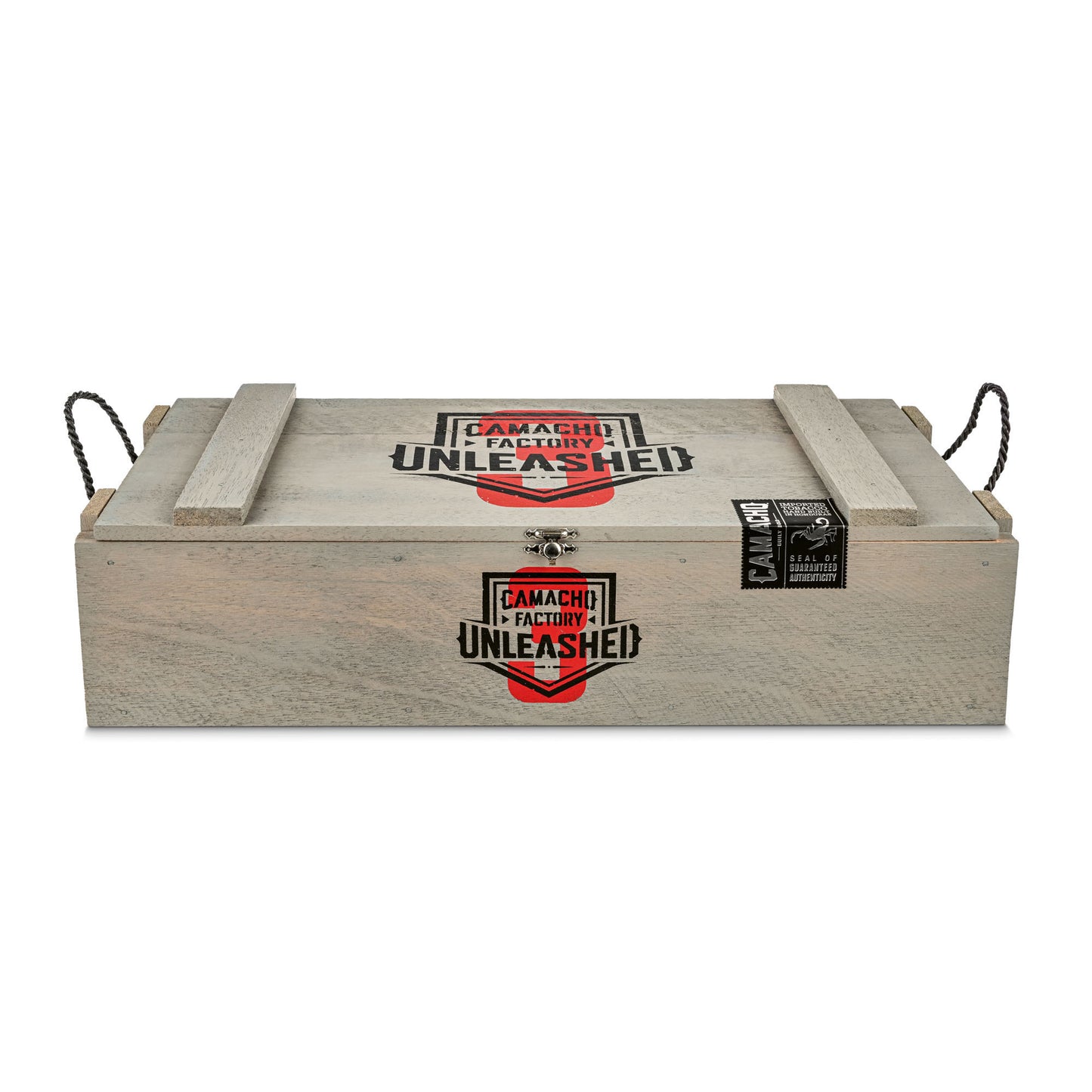Wooden box with Camacho Factory Unleashed branding, featuring a rustic design and secure metal handles.