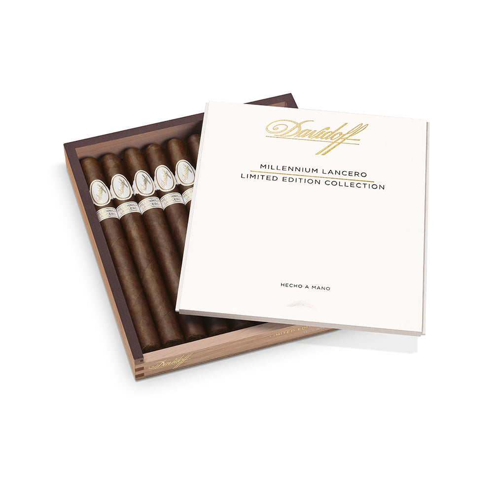 Open box of Davidoff Millennium Lancero Limited Edition cigars with decorative labels and elegant packaging.