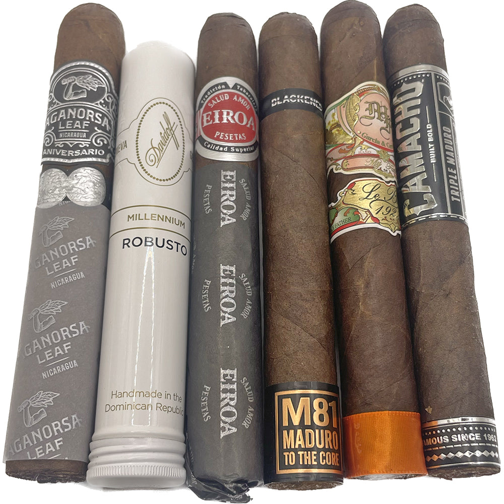 Assorted cigars including Aganorsa Leaf, Davidoff Millennium Robusto, Eiroa, Blackened, My Father Le Bijou, Camacho Triple Maduro, arranged vertically.